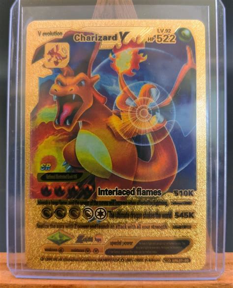 charizard v lv 92 hp 522 gold|Charizard V gold foil pokemon.